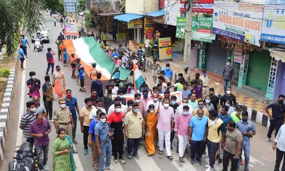 MLA Bhumana Karunakar Reddy participates in the Olympic run held in Tirupati on Sunday. Mayor Dr R Sirisha is also seen