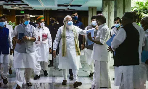 Prime Minister Narendra Modi leaves after an all-party meeting, a day before the monsoon session of Parliament begins, in New Delhi on Sunday