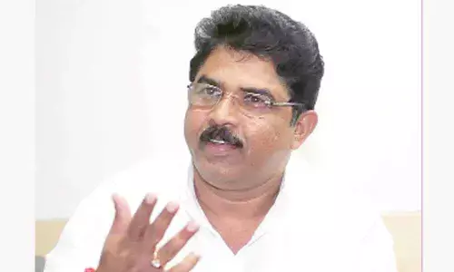 Revenue Minister R. Ashoka