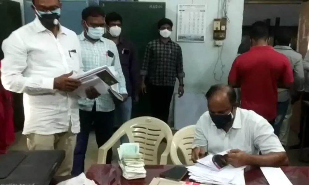 Anti-Corruption Bureau officials verifying the records at a Tahsildar office in Visakhapatnam on Tuesday