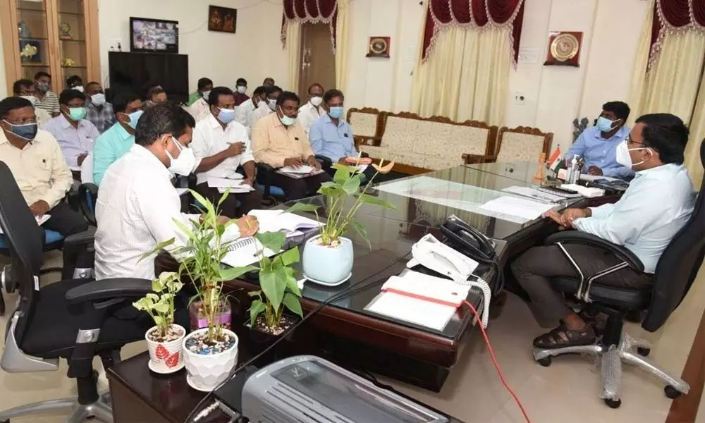 District Collector KVN Chakradhar Babu holding a review meeting on Nadu-Nedu with the officials in Nellore on Tuesday