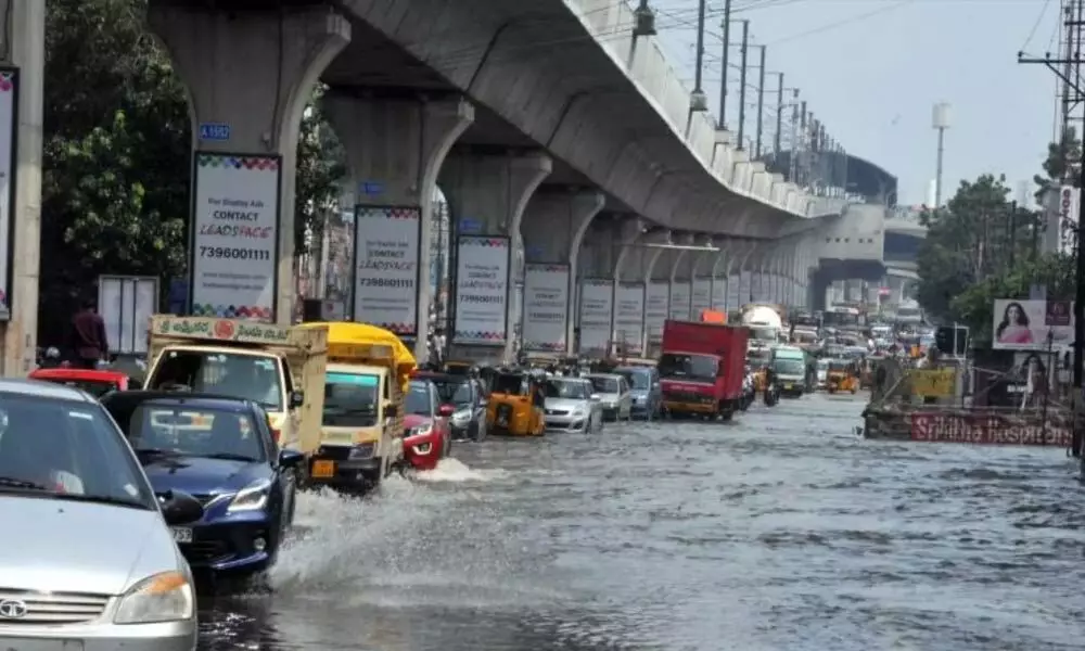 Hyderabad city is inundated with heavy rain due to the surface trough.