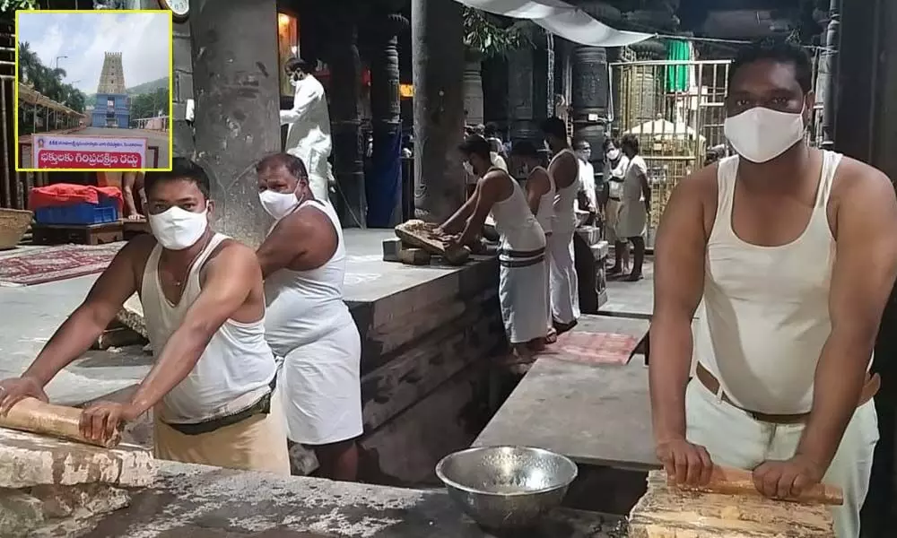 Temple staff grinding the logs to obtain sandalwood paste at Simhachalam Devasthanam. It will be offered to Lord  Sri Varaha Lakshmi Narasimha Swamy on July 24 on the occasion of ‘Ashada Pournami’.