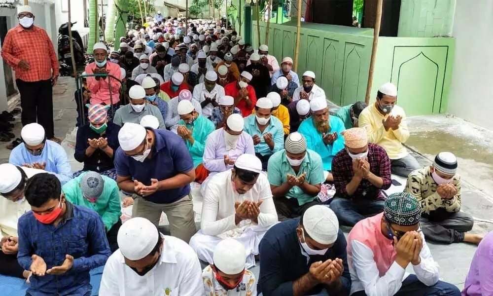 Muslims participating in the Eid-ul-Adha prayers at the Pedda Maseedu in Ongole on Wednesday