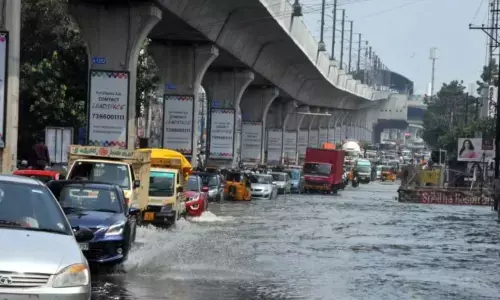 Hyderabad city is inundated with heavy rain due to the surface trough.