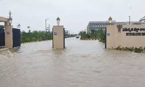 Newly inaugurated Integrated District Collectorate Complex at Sircilla town in Rajanna-Sircilla district inundated with floodwaters on Thursday