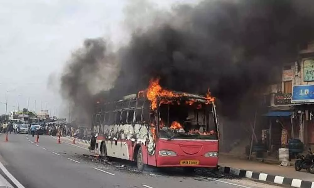 An RTC bus goes up flames at Station Ghanpur in Jangaon district on Friday