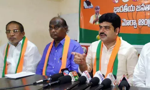 AP BJP Kisan Morcha vice-president Puli Venkata Reddy addressing a press meet in Ongole on Friday