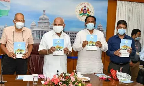 File photo of Chief Minister B S Yediyurappa launching bike taxis on July 14