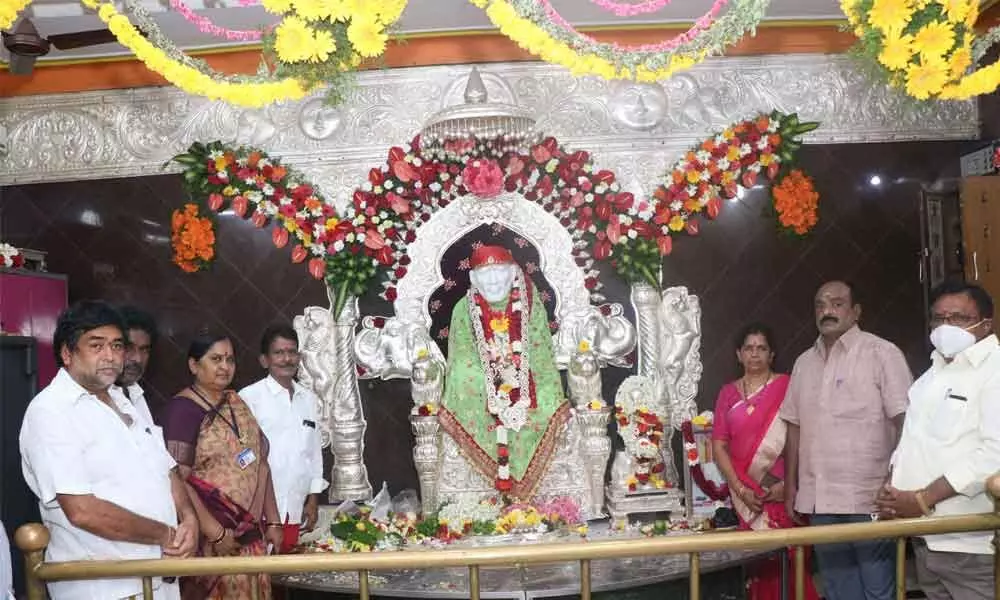 Devotees celebrating Guru Purnima at Sai Baba temple in Tirupati on Saturday.