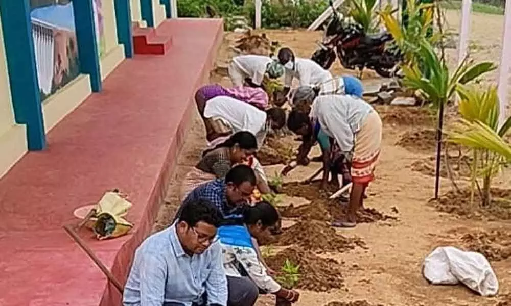 People planting saplings as part of  Mukkoti Vruksharchana on Saturday
