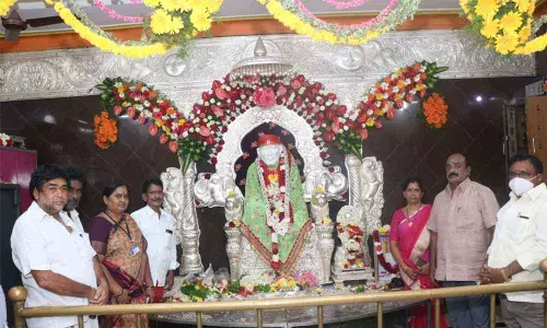 Devotees celebrating Guru Purnima at Sai Baba temple in Tirupati on Saturday.