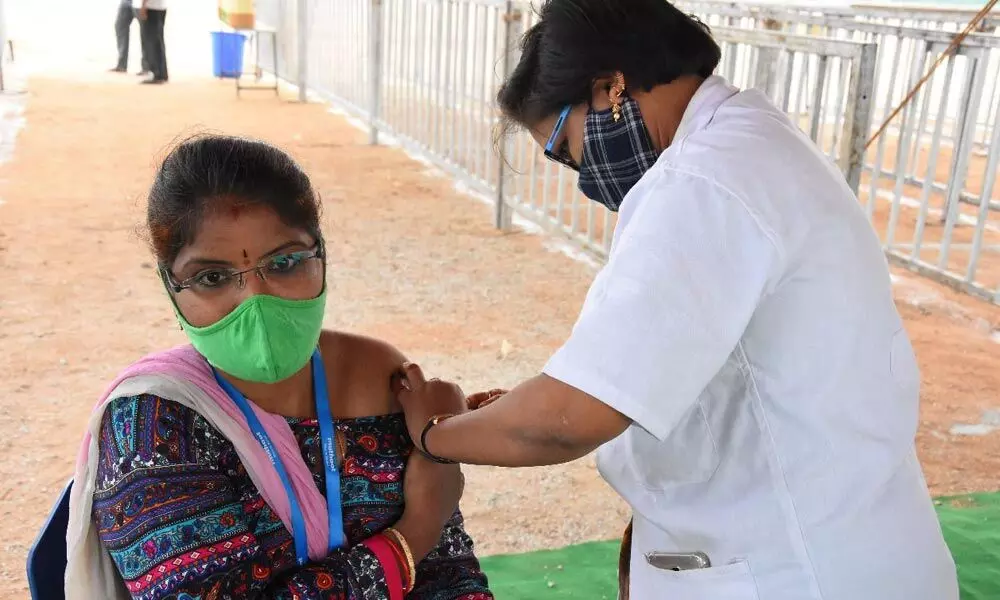 A woman taking jab at a health centre in Tirupati