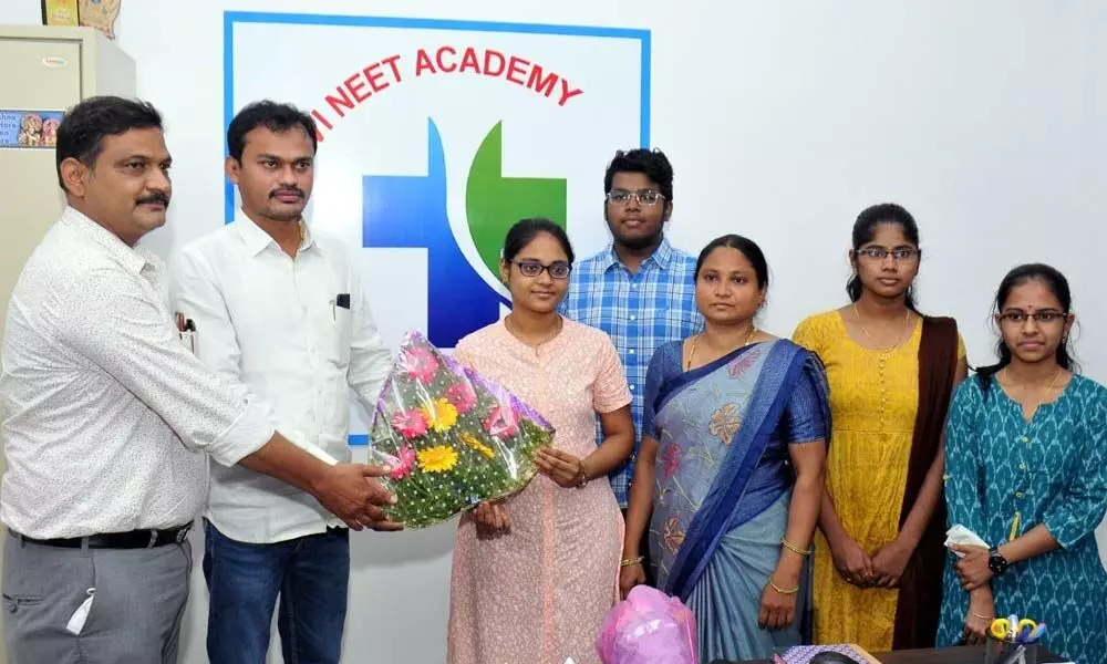 Jahnavi NEET Academy management congratulating toppers in Intermediate exams
