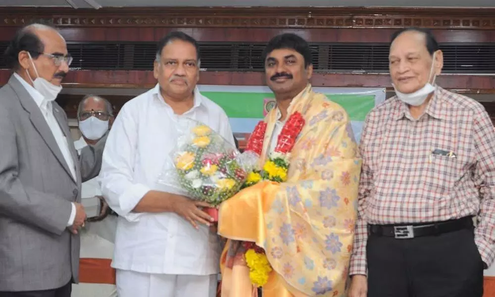 Former Deputy Speaker of the Assembly Mandali Buddha Prasad felicitating DRDO chairman G Satheesh Reddy in Vijayawada on Sunday