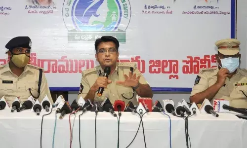 Guntur Range DIG Trivikram Varma addressing media in Nellore on Sunday. SP Ch Vijaya Rao is also seen.