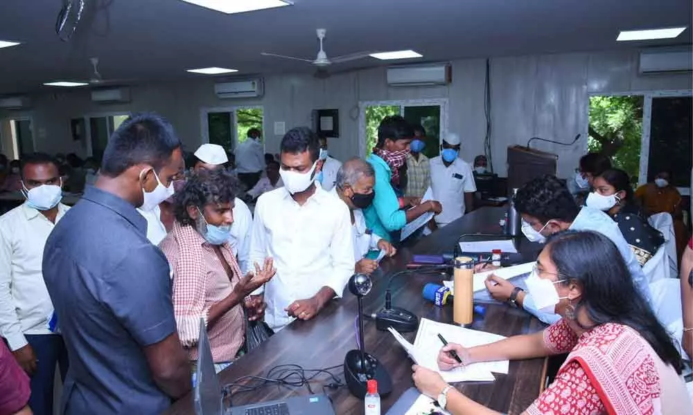 District collector Naga Lakshmi Selvarajan receiving petitions from people at Revenue Bhavan in Anantapur on Monday
