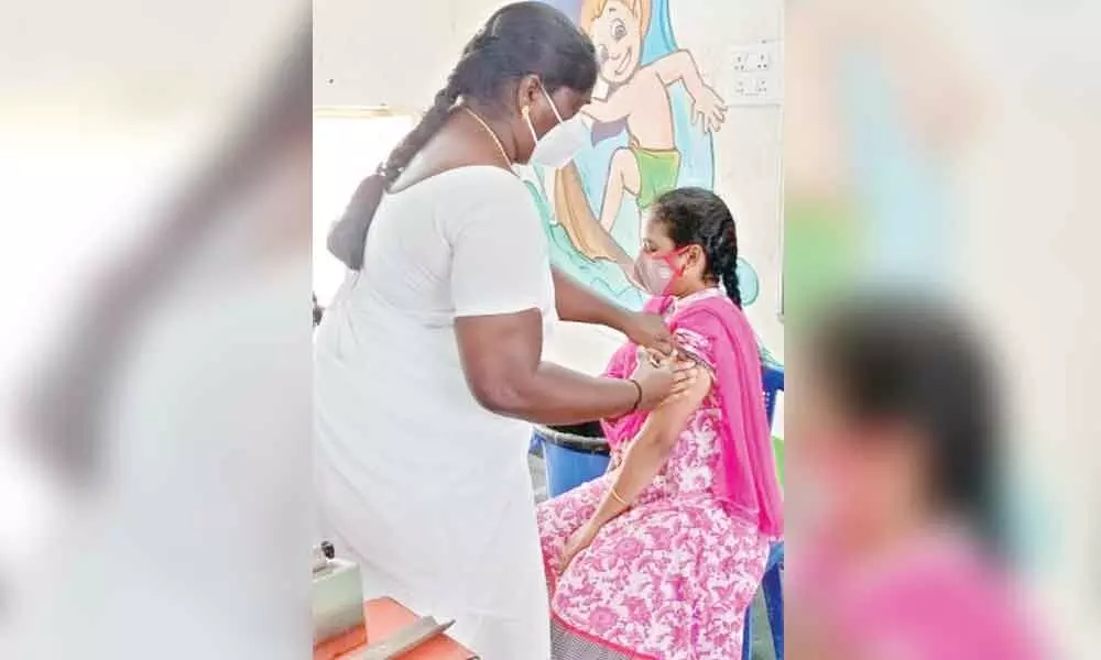 A woman receiving Covid vaccine in Ongole on Monday