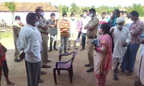 Representatives of Anganwadi teachers, ICPS, police, revenue and NGO organisations take part in a drive against child marriage, at Ramampet Thanda on Monday