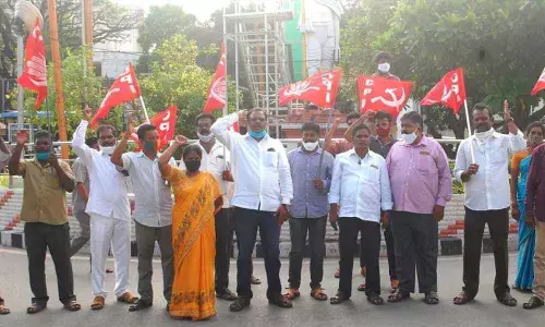 CPI  leaders and activists staging a protest at the Gandhi Statue in Tirupati on Monday.