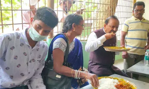 Collector M Hari Jawaharlal having lunch along with visitors at the canteen at the Collectorate in Vizianagaram on Monday