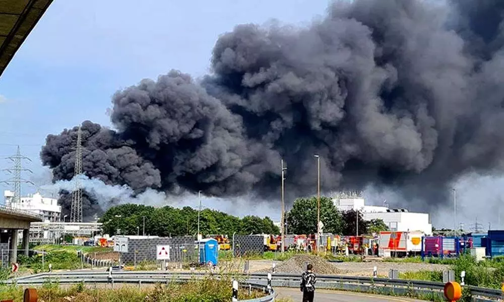 Column of smoke rising near the Bayer site at Germanys Leverkusen city