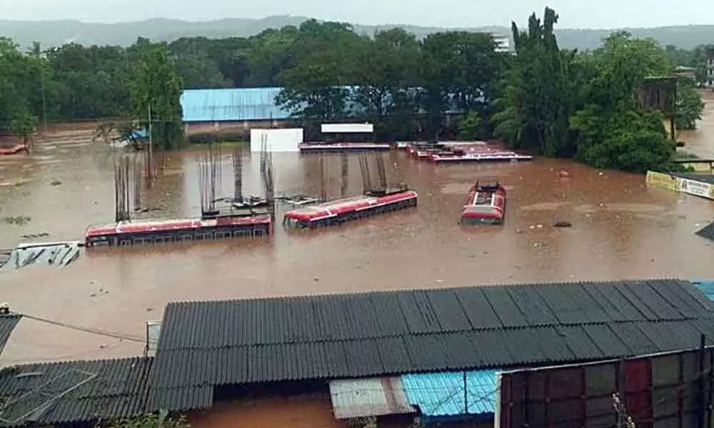 Depot manager sits on submerged bus for hours to save Rs 9 Lakh cash