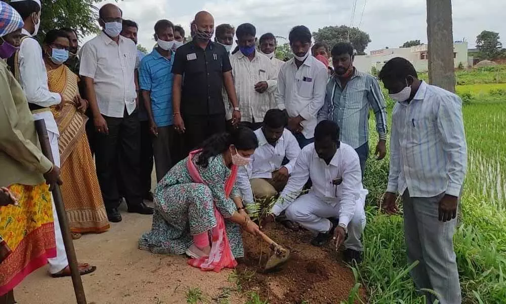 District Collector Pamela Satpathy with other officials in Vasalamarri village on Monday