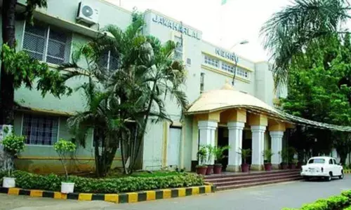 TDP leaders protesting against user charges imposed on garbage collection during VMC council meeting held recently in Vijayawada(file photo)
