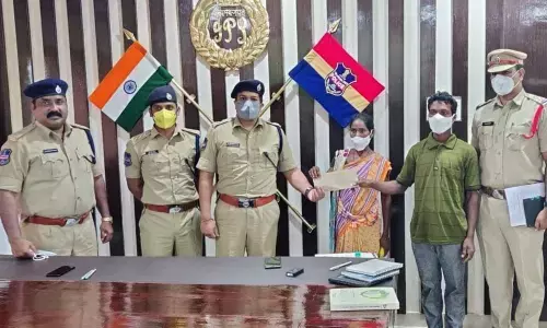 Maoists surrendering before Mulugu Superintendent of Police Sangramsingh G Patil on Tuesday