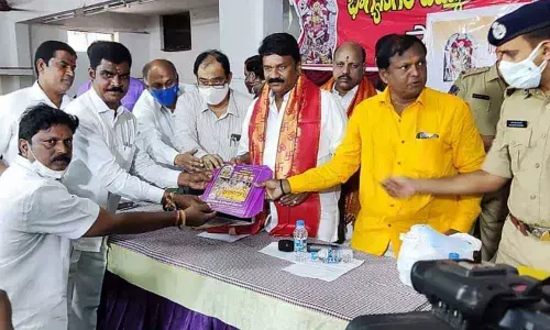 Talasani Srinivas Yadav along with temple committee members released the brochure