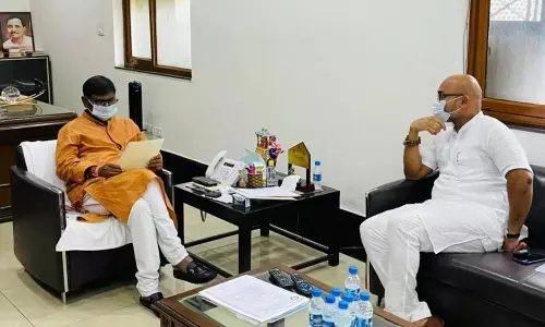 Nizamabad MP Arvind Dharmapuri during his meet with Union Minister for Tribal Affairs Arjun Munda in Delhi on Tuesday