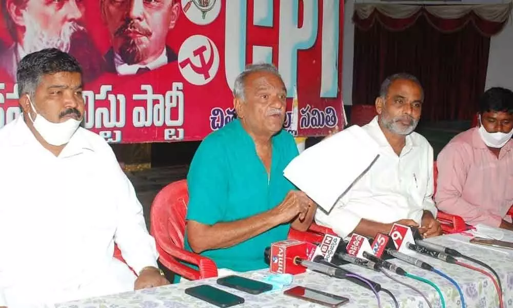 CPI national general secretary K Narayana along with other party leaders, addressing the media in Tirupati on Wednesday