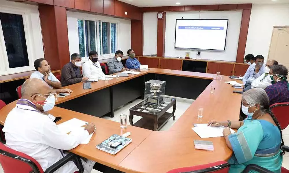 TTD Executive Officer Dr K S Jawahar Reddy holds a review meeting with Corporation Commissioner P S Girisha on the Garuda Varadhi in Tirupati on Thursday