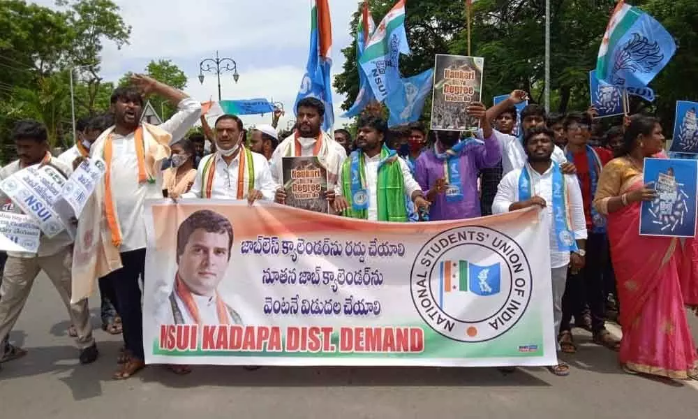 Students under the aegis of NSUI staging a protest demanding release of new job calendar at the Collector’s office in Kadapa on Thursday.