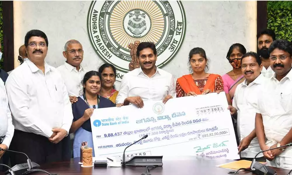 Chief Minister Y S Jagan Mohan Reddy transfers second instalment of Jagananna Vidya Deevena (fee reimbursemnt) amount to the accounts of beneficiaries, at his camp office in Tadepalli on Thursday