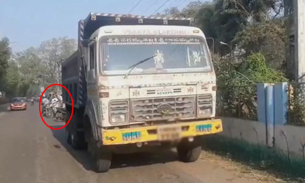 Two girls dies after a lorry collides a two wheeler in West Godavari