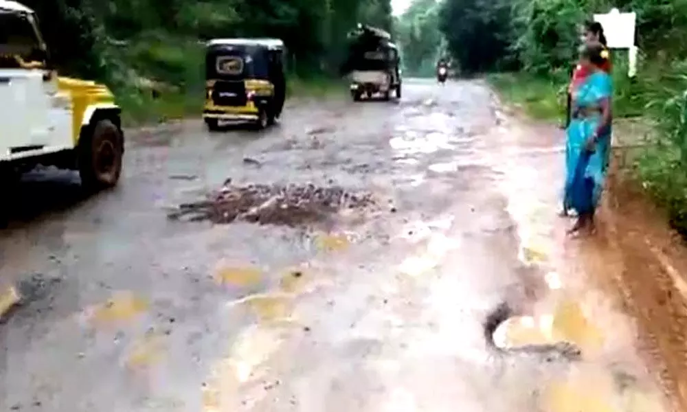 This pothole-ridden road has been a threat to the lives of the commuters since the last three years, says Ananthavathi. (Photo | Express)