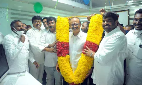 K Ajay Reddy being felicitated after he takes charge as APSSDC Chairman in Tadepalli of Guntur district on Friday