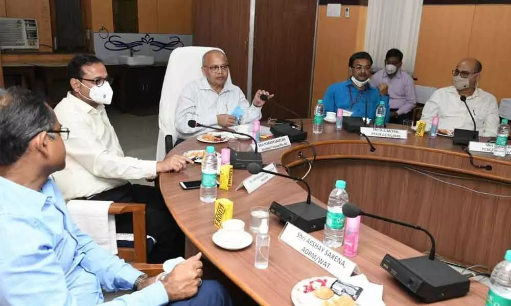 Railway Board Member (Finance) Naresh Salecha speaking to the railway officials of Waltair division in Visakhapatnam on Saturday