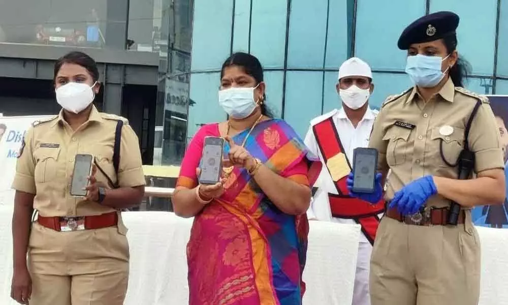 GVMC Mayor G Hari Venkata Kumari along with DCP-I Gowthami Sali and ACP of Disha police station Prem Kajal at Disha app awareness programme held in Visakhapatnam on Saturday