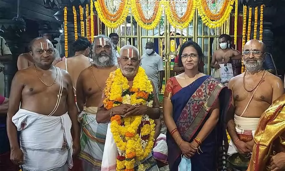 Simhachalam  Devasthanam chief priest Godavarthi Gopala Krishnamacharyulu being felicitated on his retirement by the temple staff in Visakhapatnam on Saturday