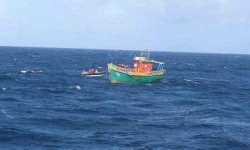 INS Airavat rendering assistance to a fishing boat in distress