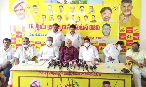 Former chairman of Brahmin Welfare Corporation Vemuri Ananda Surya addressing the media at the TDP office in Kakinada on Saturday
