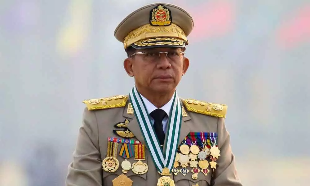 FILE PHOTO: Myanmars junta chief Senior General Min Aung Hlaing, who ousted the elected government in a coup on February 1, presides an army parade on Armed Forces Day in Naypyitaw, Myanmar, March 27, 2021.
