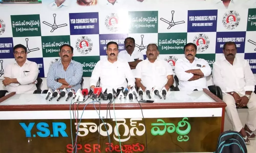 Sarvepalli MLA K Govardhan Reddy addressing the media in Nellore on Sunday