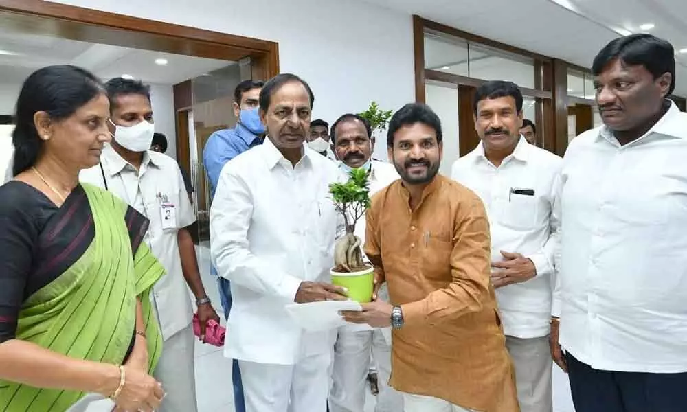 Vikarabad MLA Dr Methuku Anand presenting a sapling to Chief Minister K Chandrashekar Rao during his visit to Pragathi Bhavan on Sunday. Education Minister Sabitha Indra Reddy and MLAs Mahesh Reddy and Subhas Reddy are also seen
