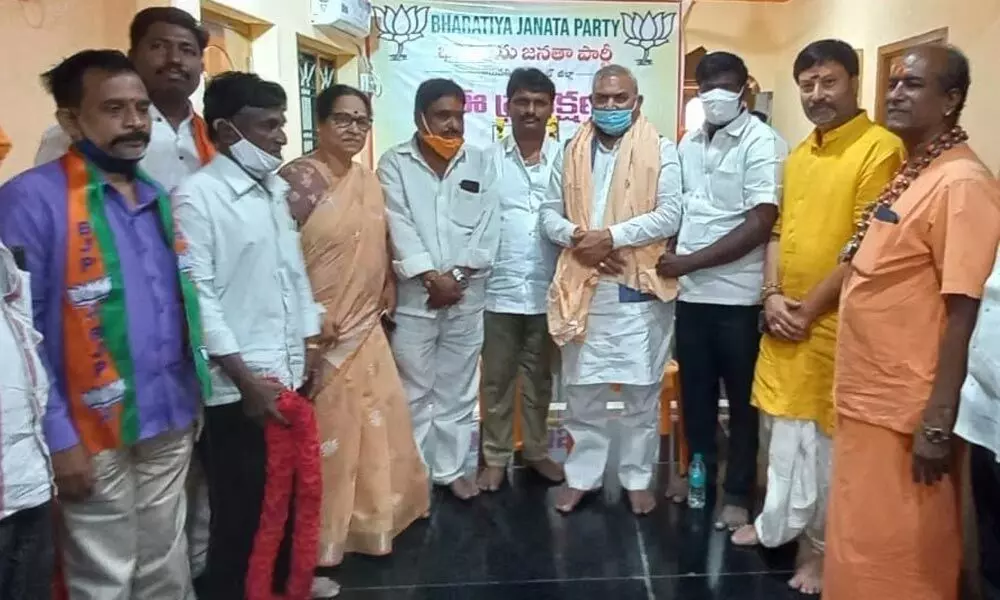 Tirupati BJP leaders along with national leader Siva Prakash after a party meeting at the BJP office in Tirupati  on Sunday