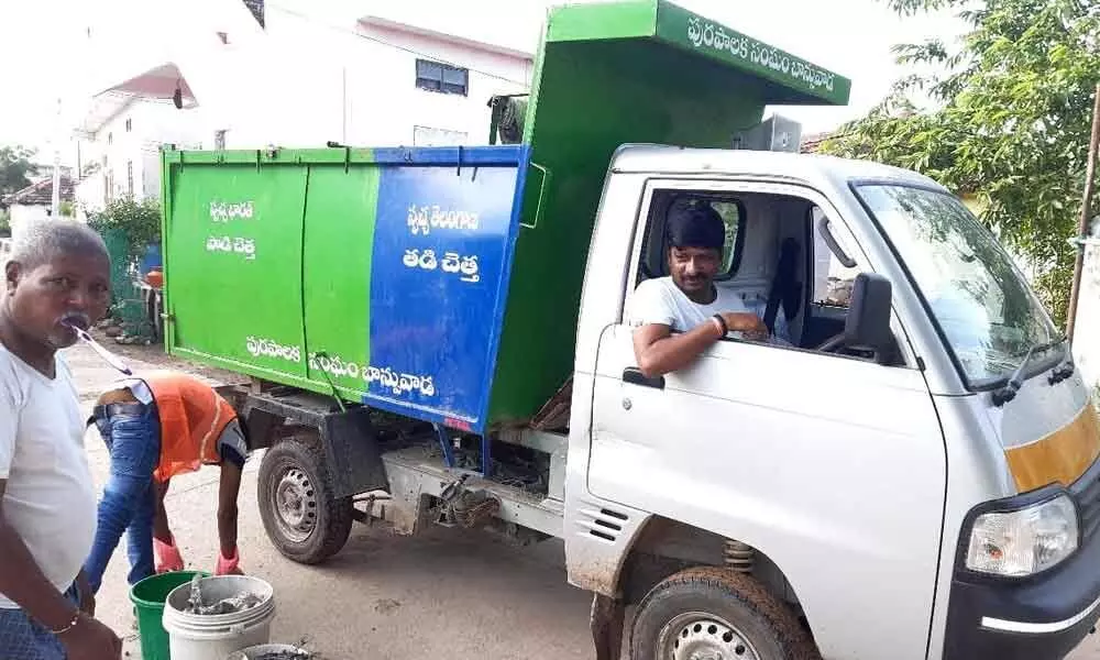 11th ward councillor Lingameshwar driving a garbage collection truck in Banswada on Monday