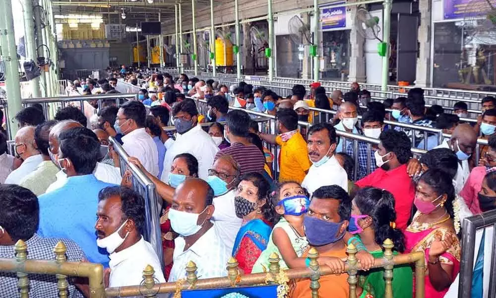 Devotees in the packed queue lines at Kanipakam temple in Chittoor district on Sunday.